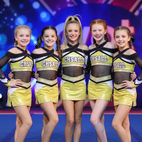 Elite Kids Yellow and Black Cheer Uniform with Mesh Midriff Cross Neck and Shiny Skirt for Competitions